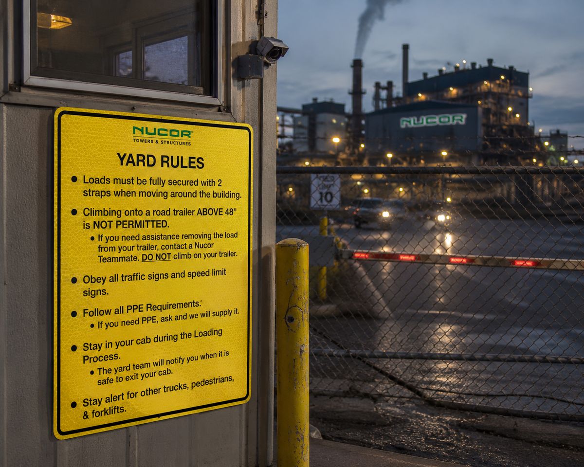Reflective metal yard rules sign for an industrial plant